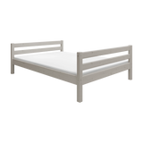 FLEXA single bed from the FLEXA collection in grey, 140x200 cm, with horizontal slats, shown on white background.