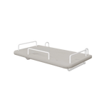 FLEXA bedside tray from the GREY collection, grey MDF with four white metal handles, child-safe edges, by a bed.