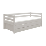 FLEXA grey single bed with pull-out underbed, storage drawers and safety rail, shown in a child’s bedroom.