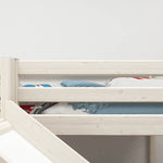 FLEXA WHITE high bed with slide and safety rail, 90x200 cm, in a child’s room; safe design with playful bedding.