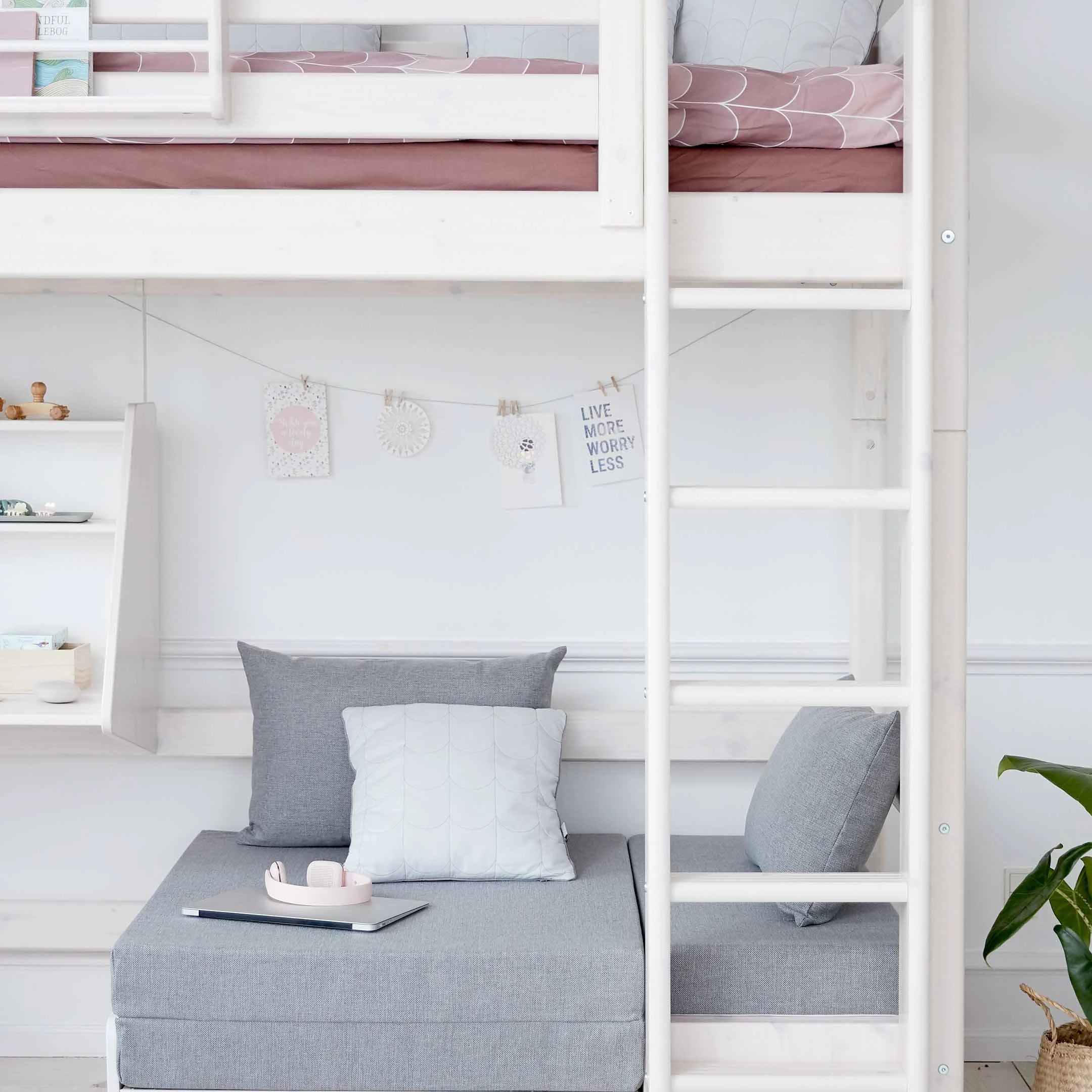FLEXA HIGH BED in white with sofa, desk, ladder and safety rail; child-safe; shown in children’s bedroom setting.