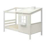 FLEXA WHITE single bed, 1/2 house design with ladder, slatted base and window, child-safe details, in kid’s room.